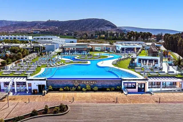 Infinity pool at Resort Cordial Santa Águeda & Perchel Beach Club, offering stunning views and lush surroundings in one of the top gran canaria hotels 5 star.