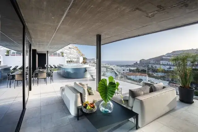 Spacious terrace with private pool at The One 5* Luxury Apartments in Gran Canaria, featuring stunning ocean views and modern design.