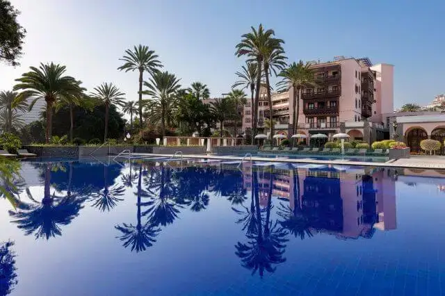 Exterior view of Santa Catalina, a Royal Hideaway Hotel, one of the finest Gran Canaria hotels 5 star, featuring elegant architecture and lush surroundings.